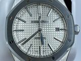an image of a close up of a watch on a white surface