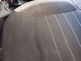 a picture of the inside of a car with the seat up