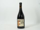 a bottle of wine that is sitting on a table