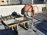 a wheelbarrow and a wheelbarrow on the roof of a building