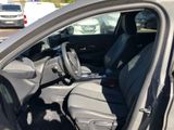 the interior of a car with the driver ' s seat folded down