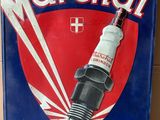 une image représentant une affiche publicitaire pour une bougie d'allumage, dans un cadre