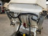 an image of a machine that is sitting in a garage
