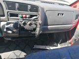 a dashboard of a car with a radio in it