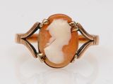 an image of a lady ' s ring with a carved cameo