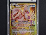 gros plan d'une carte pokemon sur une surface noire