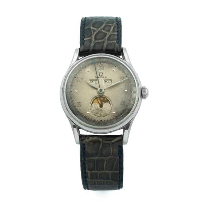 an image of a wrist watch with a moon on the dial