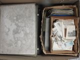 a box full of money sitting on top of a floor