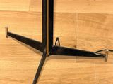 an image of a table with a black metal base