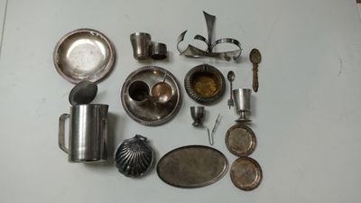 many different types of kitchen utensils laid out on a table