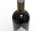 a bottle of wine that is sitting on a table