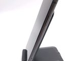 a cell phone that is sitting on top of a stand