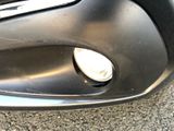 a close up view of a car ' s front bumper