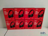 six boxes of headphones are stacked on top of each other