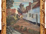 an oil painting of a street with houses and trees in a gold frame