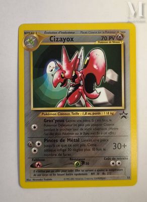 the pokemon card is on display on a white surface