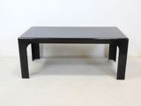 an image of a black coffee table sitting on top of a white floor