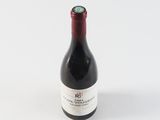 a bottle of wine that is sitting on a table