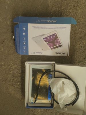 boxed picture of a box with a phone inside of it on the floor