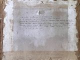 a piece of paper with writing on it sitting on a table