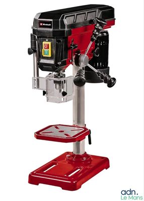 an image of a drill machine on a stand