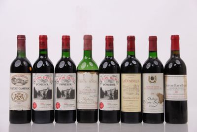 six bouteilles de vin alignées sur une table