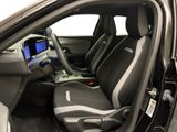 the interior of a car with the door open and the seat up