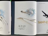 a book with a drawing of a man and a plane on it