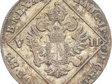 gros plan d'une pièce de monnaie sur fond blanc