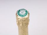a close up of a bottle of champagne on a table