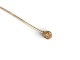 an image of a stick with a flower on it