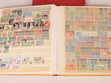 an open book with a lot of stamps on it
