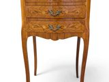 an image of a small chest of drawers with drawers on each side