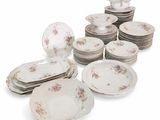 a lot of plates that are sitting on a table