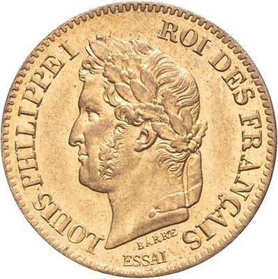 a gold coin with a head of a man wearing a crown