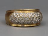 an image of a gold ring with diamonds on it