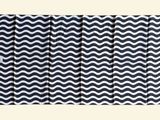 black and white zigzag blanket with red trim