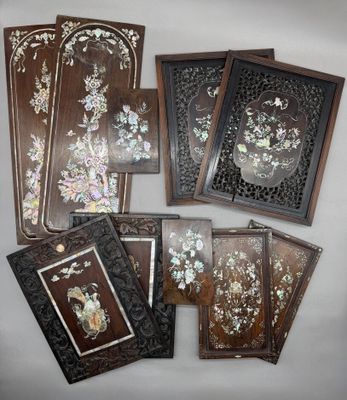 six morceaux de bois ornés de motifs floraux sur un fond blanc