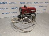 an image of a small air compressor sitting on top of a table