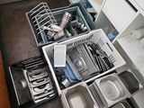 a lot of dishes and pans that are in the kitchen