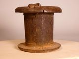 an old hat on top of a wooden table