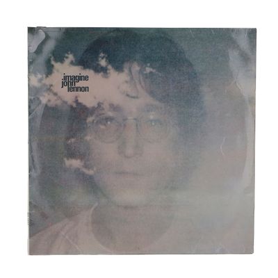 an image of a picture of a woman with glasses and a tree in the background