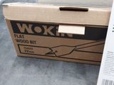 a box that has a sign on it that says wok