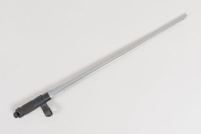 a close up of a metal pole on a white surface