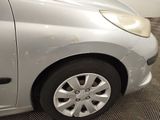 a picture of a silver car with a flat tire