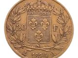gros plan d'une pièce de monnaie surmontée d'une couronne