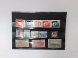 a picture of a collection of stamps in a display case