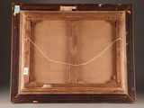 an old wooden frame with a painting of a bird on it