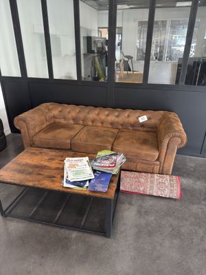 a couch and a coffee table in a living room