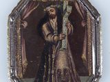 an old picture of a man holding a cross in his hand